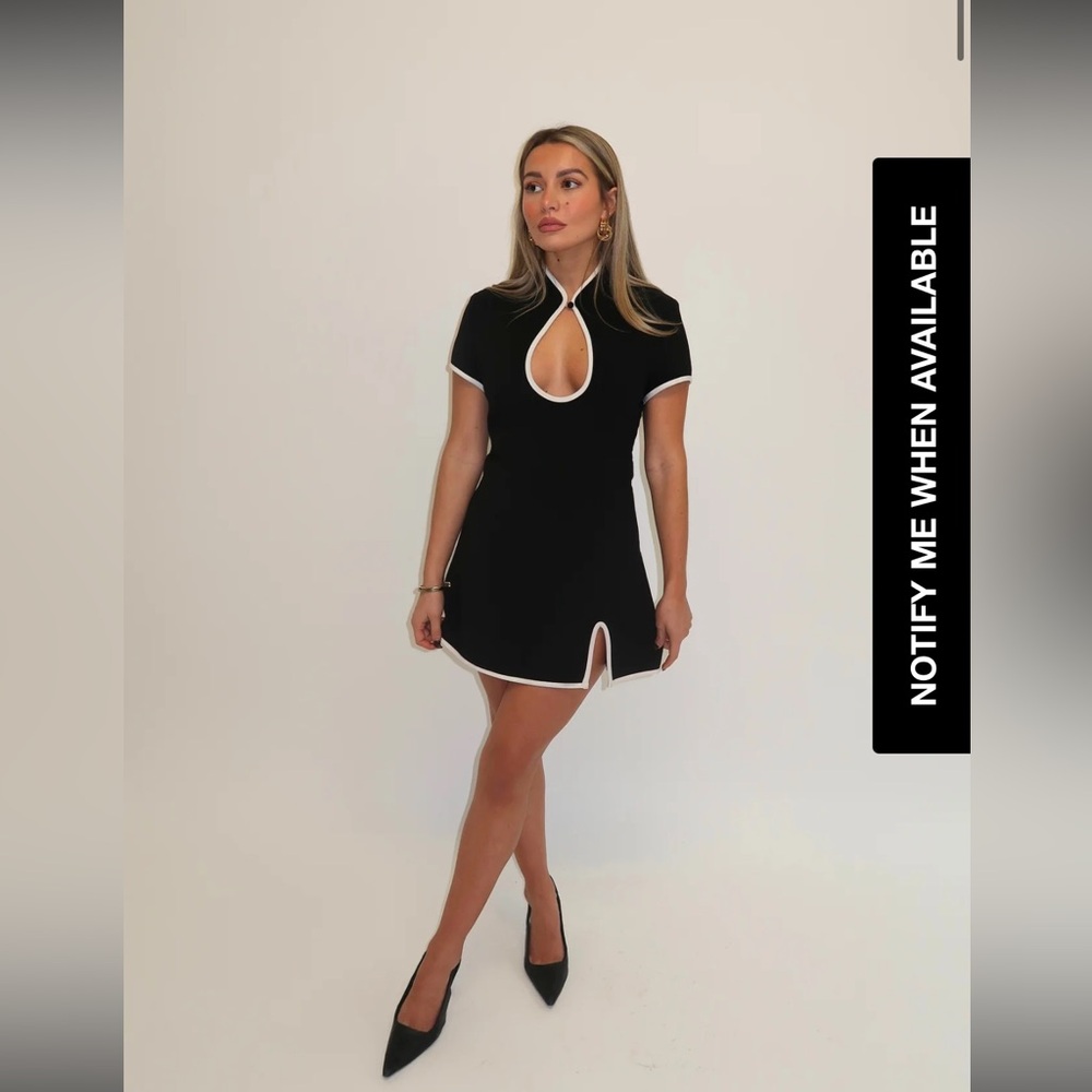 Elegant Black Mini Dress with White Trim